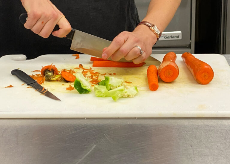 cutting veggies in the kitchen